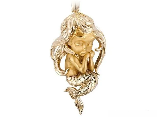 A beautifully crafted mermaid pendant with a substantial, solid feel, highlighting its high-quality materials and meticulous jewelry craftsmanship.