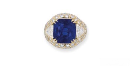 14.70ct cushion-cut Kashmir sapphire ring set in gold with diamond accents, rare sapphire auction piece.
