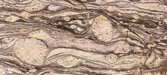 Mylonite rock formation, illustrating the geological process and texture of this metamorphic rock.