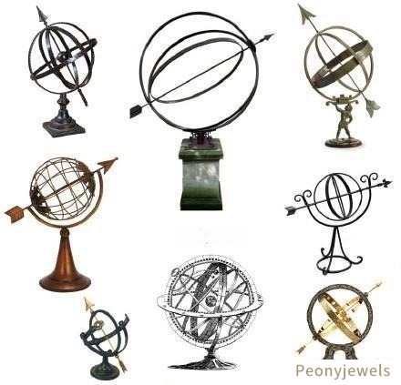 Collection of various astronomical metal spheres showcasing miniature armillary designs and historical mechanical jewelry craftsmanship
