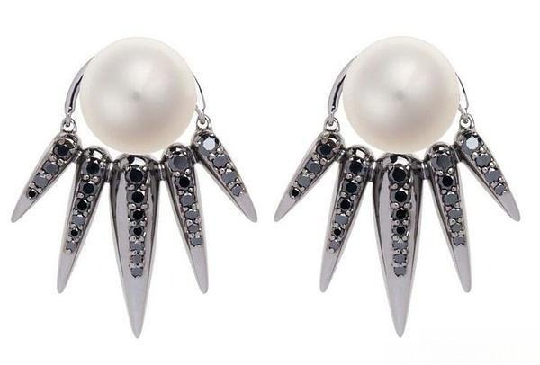 Pearl stud earrings combining dark brilliance with soft luster, modern elegant jewelry design.