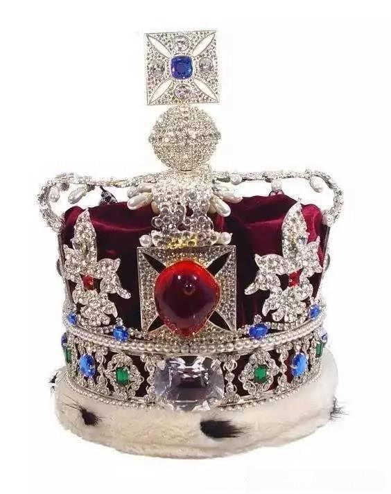 Magnificent imperial crown featuring exquisite red spinel gemstones, showcasing royal elegance and brilliance
