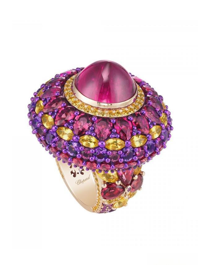 Chopard ruby and gold ring, showing how the red and yellow combination creates a dazzling yet harmonious effect without being overpowering.