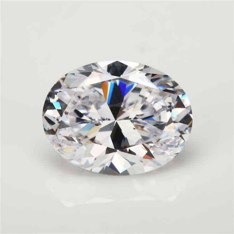 Faceted colorful white gemstone displaying iridescent play-of-color.