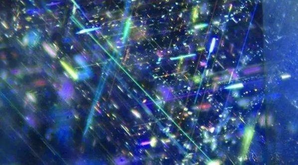 Close-up of diamond with cloud inclusions showing tiny clustered crystals that create a hazy internal effect