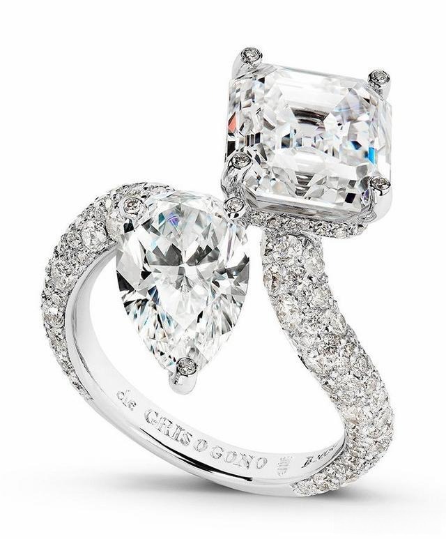 A ring featuring prong setting with diamonds encrusted along the prongs, adding extra sparkle and enhancing the overall elegance of the design.