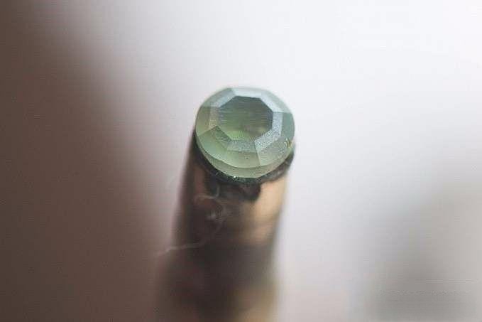 Double crown round gemstone, designed to enhance brilliance and overall gemstone luminosity