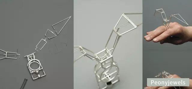 Assembly and display of Dukno Yoon's kinetic jumping ring, showcasing mechanical design and dynamic parts that mimic a bird's wing movements when the finger bends
