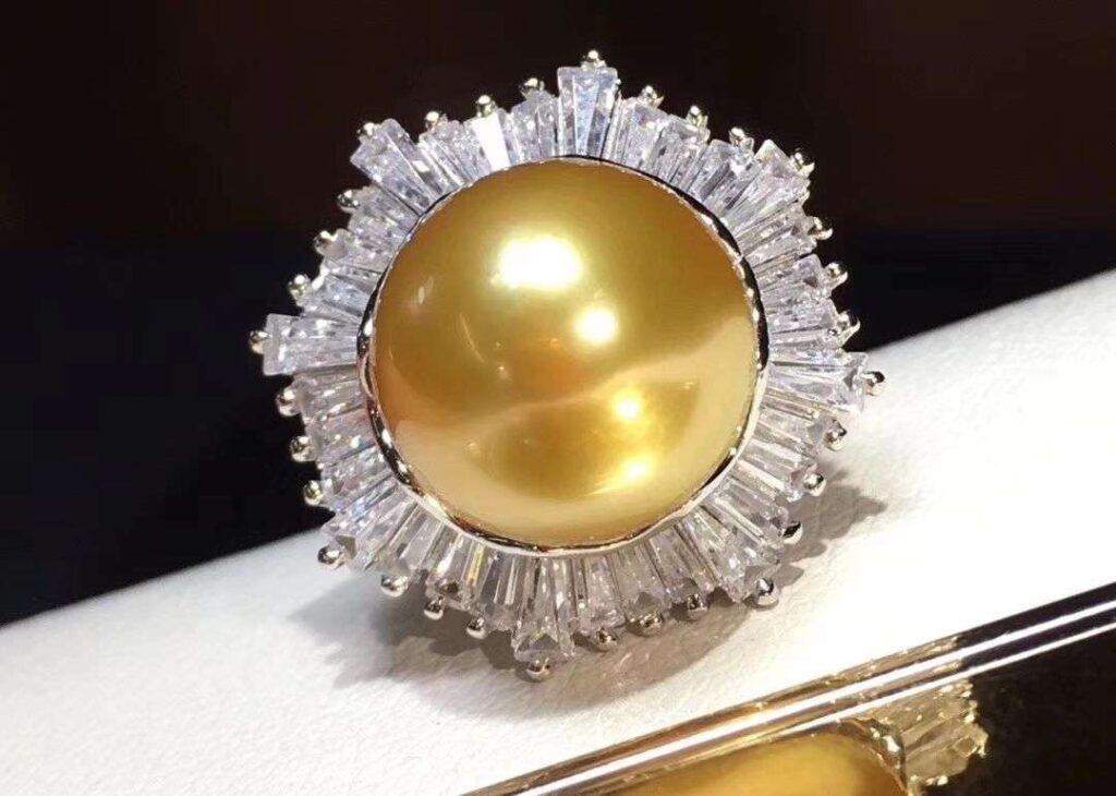 Gold bead ring appearing flawless after mounting, highlighting concealment setting technique.
