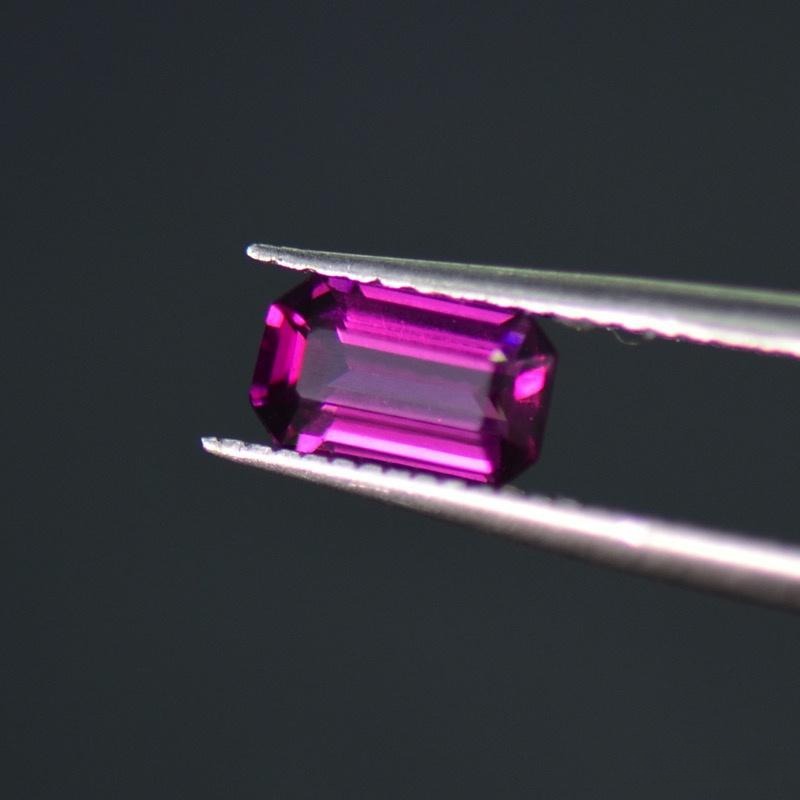 Gemstone showing a deliberately created window by the cutter, a technique often used with darker or grayer material to increase brightness.