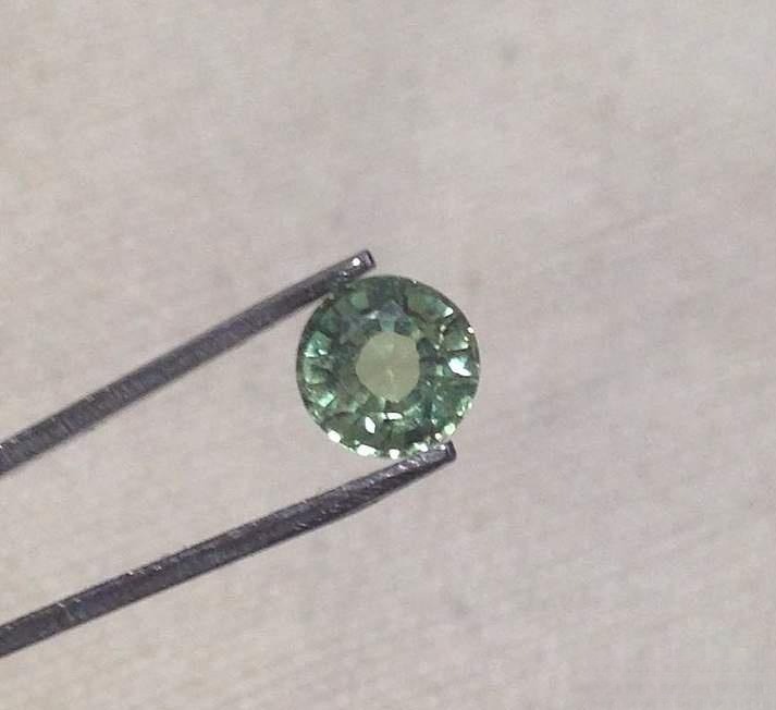 Typical examples of gemstone windowing from my early collection, showing areas where shallow pavilions reduce color saturation.