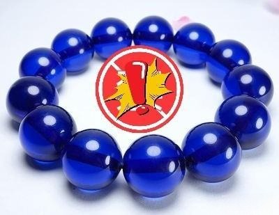 Imitation blue amber bracelet, featuring beads that resemble natural blue amber, often created from treated resin or copal.