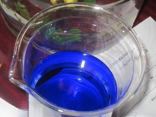 Ink completely dissolved, with the water’s color becoming uniform, illustrating the final stage of color integration similar to jadeite color foundation.