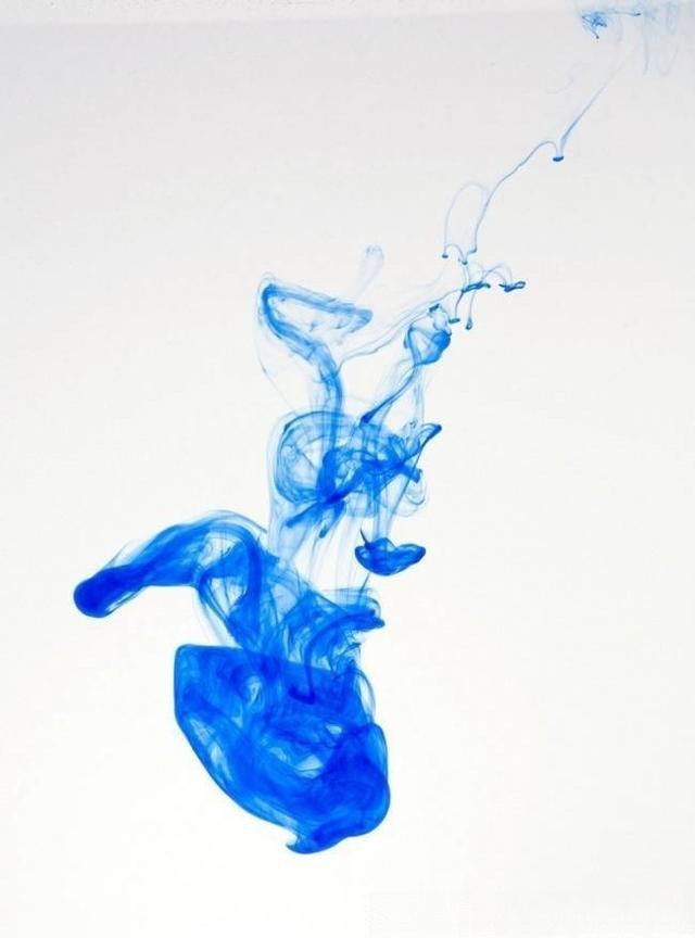 Ink first contact with water, showing a single independent ink drop forming in the water.