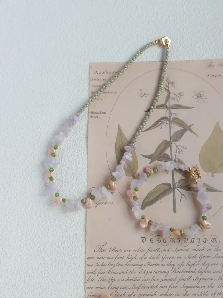 Jewea crystal bracelet and necklace set, showcasing clear quartz beads with elegant, handcrafted design for everyday wear