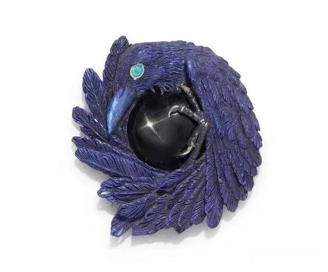 Jewelry featuring a crow design, showcasing dark-romantic style and intricate artistic craftsmanship