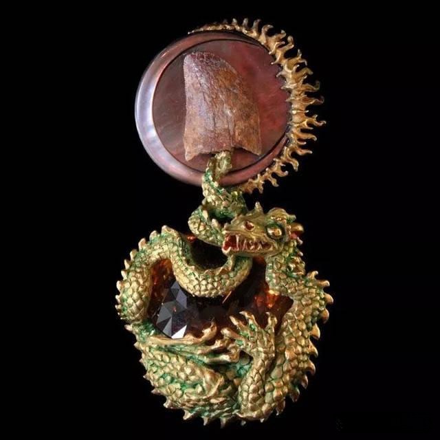 Dragon-shaped jewelry sculpture showcasing dark-romantic style, mythical symbolism, and intricate artistic craftsmanship