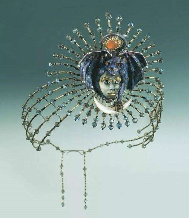 Kevin Coates Witch's Head jewelry with bat motif, capturing Halloween’s mysterious, theatrical, and surreal essence