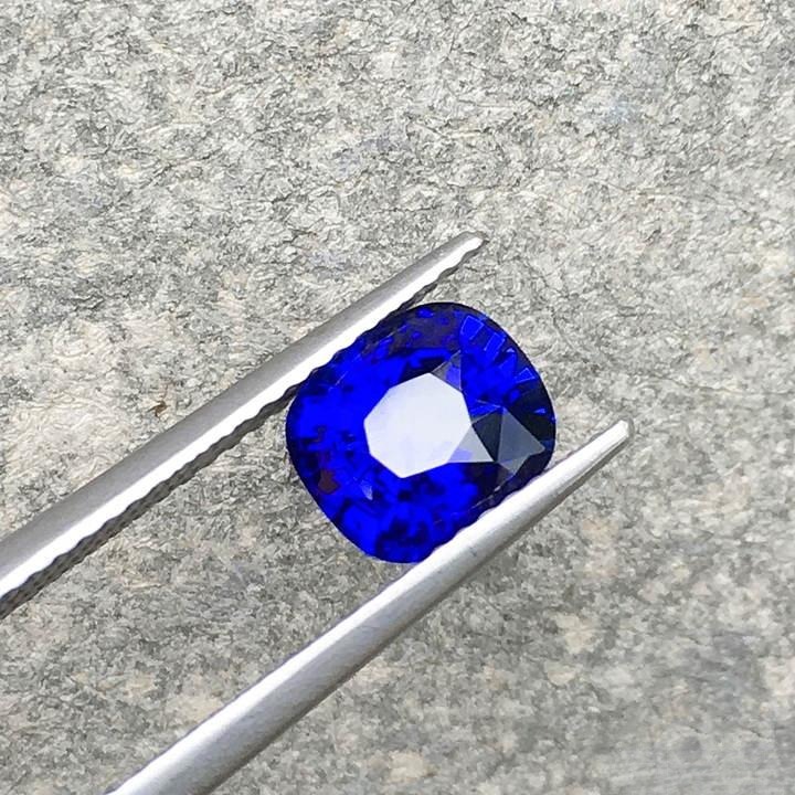 2.1-carat peacock blue sapphire with perfect cut, showcasing top-grade color, brilliance, and overall beauty.