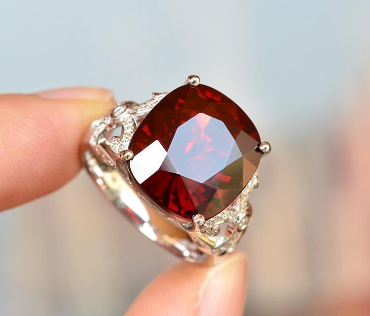 Red garnet ring displaying deep red color and clarity, an affordable ruby alternative – featured in Ruby Buying Guide.