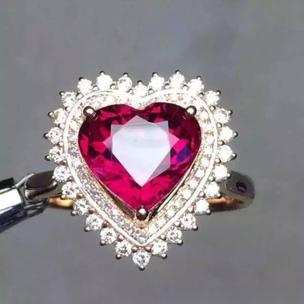 Red tourmaline (Rubellite) gemstone showcasing vibrant red color and clarity, a popular and affordable alternative to rubies – Ruby Buying Guide.