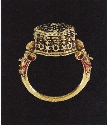 Ring featuring a hidden compartment, showcasing intricate mechanical jewelry design and secret storage functionality