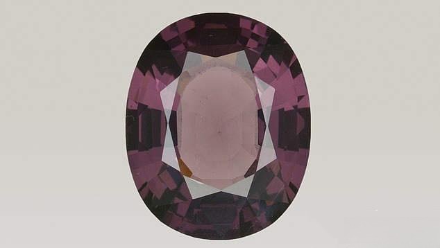 Spinel gemstone showing windowing effect, with a pale center where the color saturation is much lower than the body color.