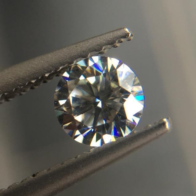 Synthetic lithium niobate crystal, highly valued in optics and electronics, a vivid example of colorful white gemstones with high-dispersion brilliance