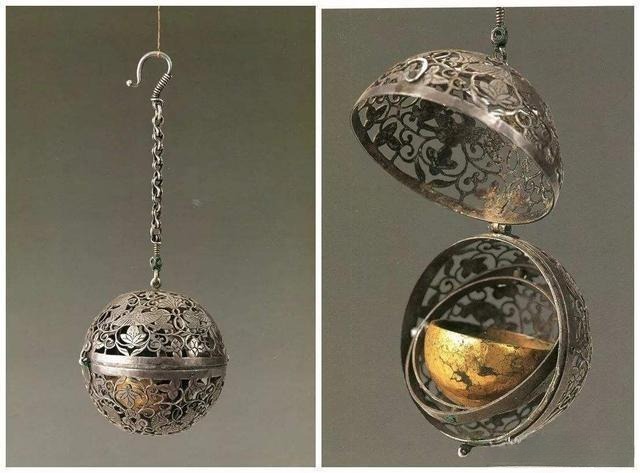 Tang Dynasty silver perfume ball featuring intricate grapevine, floral, and bird carvings, showcasing ancient Chinese craftsmanship