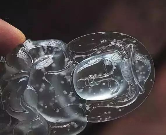 Handcrafted transparent jade Guanyin pendant , showcasing authentic A-jade quality, clarity, and translucency.