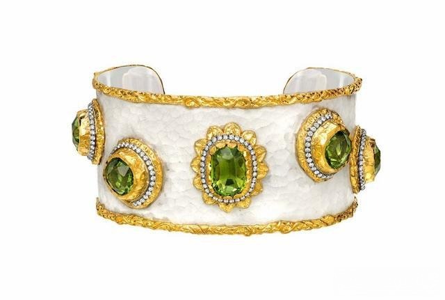 Victor Velyan peridot bracelet featuring a touch of white to balance vibrant colors and draw focus to the main design.
