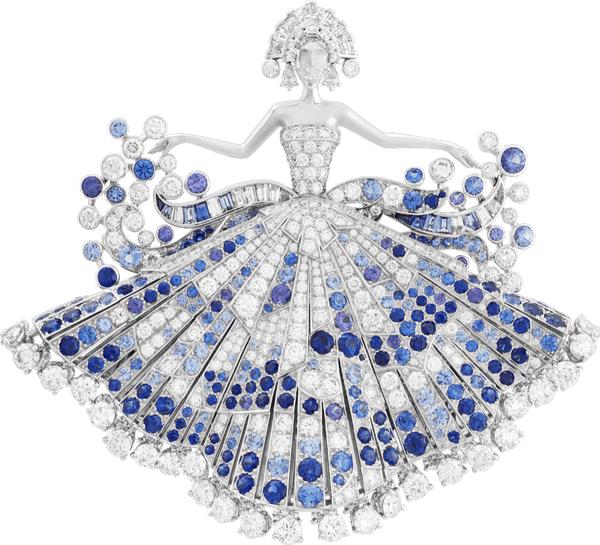 Woman wearing a dress adorned with gemstone and diamond jewelry, showcasing elegance and refined style