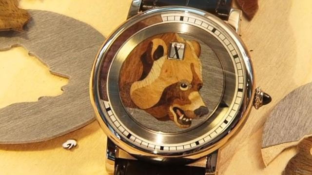 Luxury watch featuring wood inlay on the dial, showcasing intricate craftsmanship