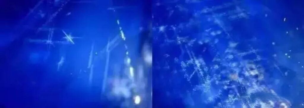 Microscopic view (30x-50x magnification) of a Kashmir sapphire, revealing snowflake inclusions and milky banding, which create the "velvet" effect.