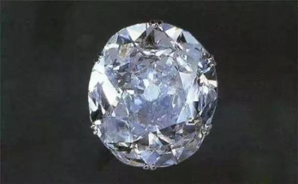 The 105.6-carat Koh-i-Noor Diamond, a historic oval-cut gem famous for its controversial history and inclusion in the British Crown Jewels.