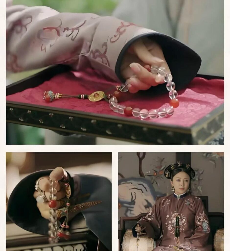 Actor gently rotating a string of crystal prayer beads with their fingers, capturing the delicate movement and luminous texture of the beads.