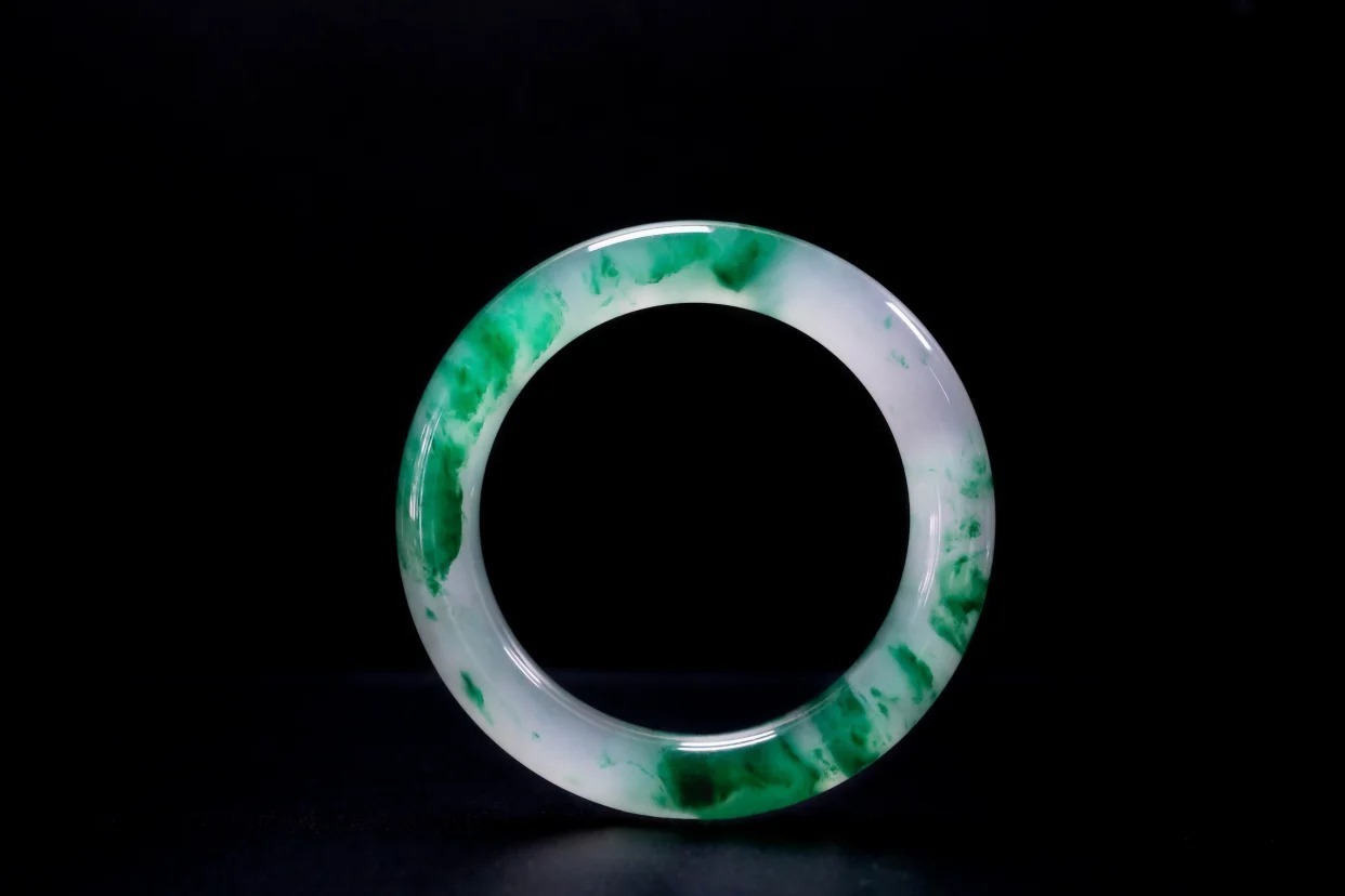 African Jade bangle showcasing soft green hues — an elegant and affordable alternative to jadeite jewelry.