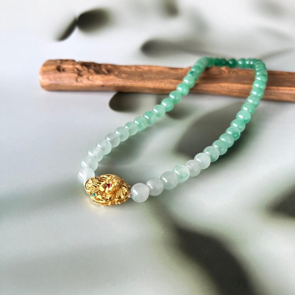 African Jade gradient bead necklace displaying smooth color transitions and natural green hues.