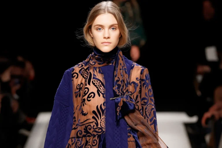 Brooch styled with a scarf, adding a chic touch and letting your accessory shine in a unique way.