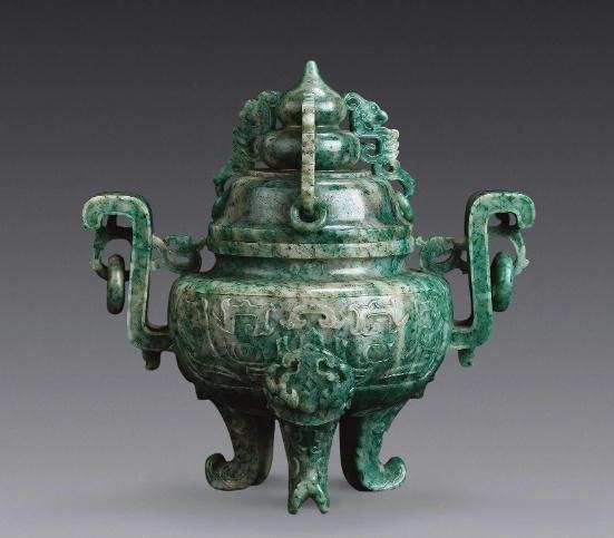 Dushan Jade tripod censer with dual handles, imperial rings, and three feet, highlighting the stone's mixed colors.