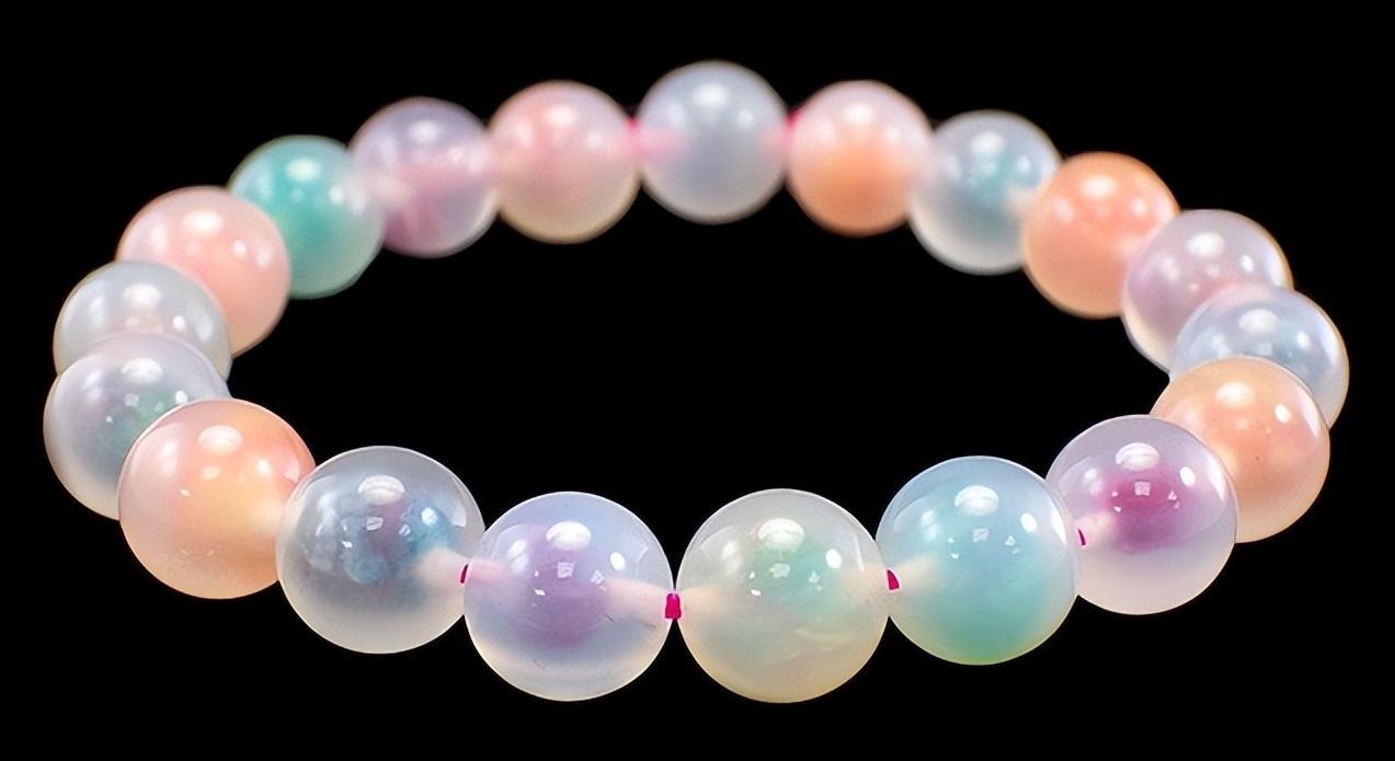 Epoxy resin filled chalcedony bracelets used as an imitation of "Candy Agate," showing color and clarity treatments.