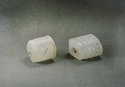 Exquisite agate beads from the Neolithic era, showcasing exceptional craftsmanship and ancient artistry.