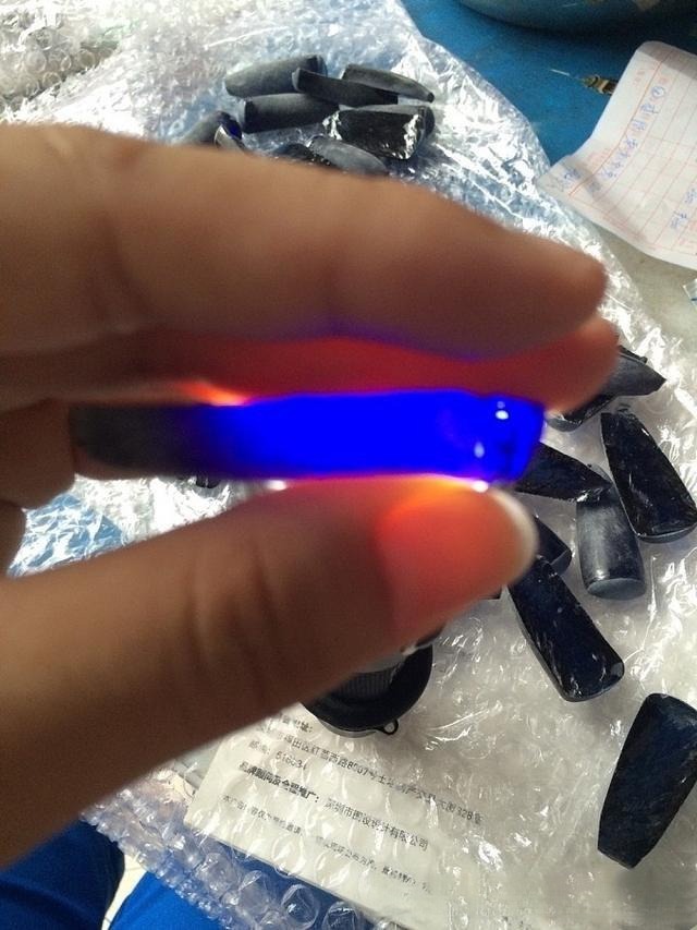 Flame-fusion (Verneuil) synthetic corundum, showcasing the vivid saturation and "super-royal blue" color often used to contrast natural sapphire.