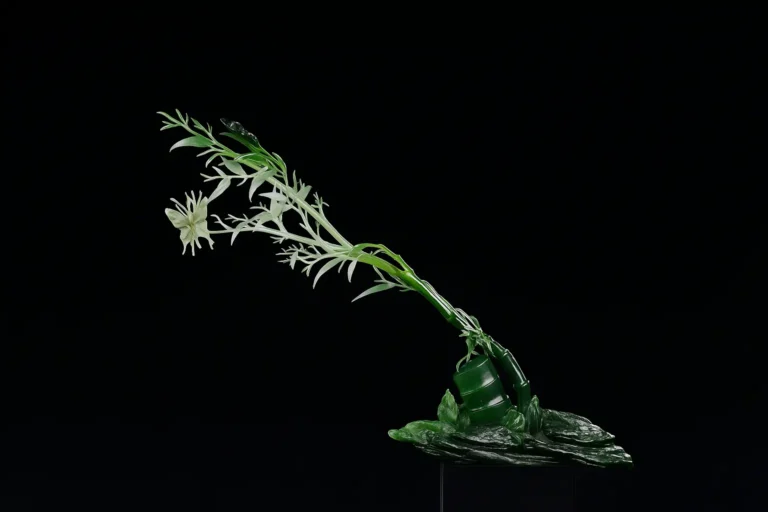 Hand-carved jade ornament showcasing the artist’s rich imagination, deep cultural insight, and exquisite aesthetic sensibility.