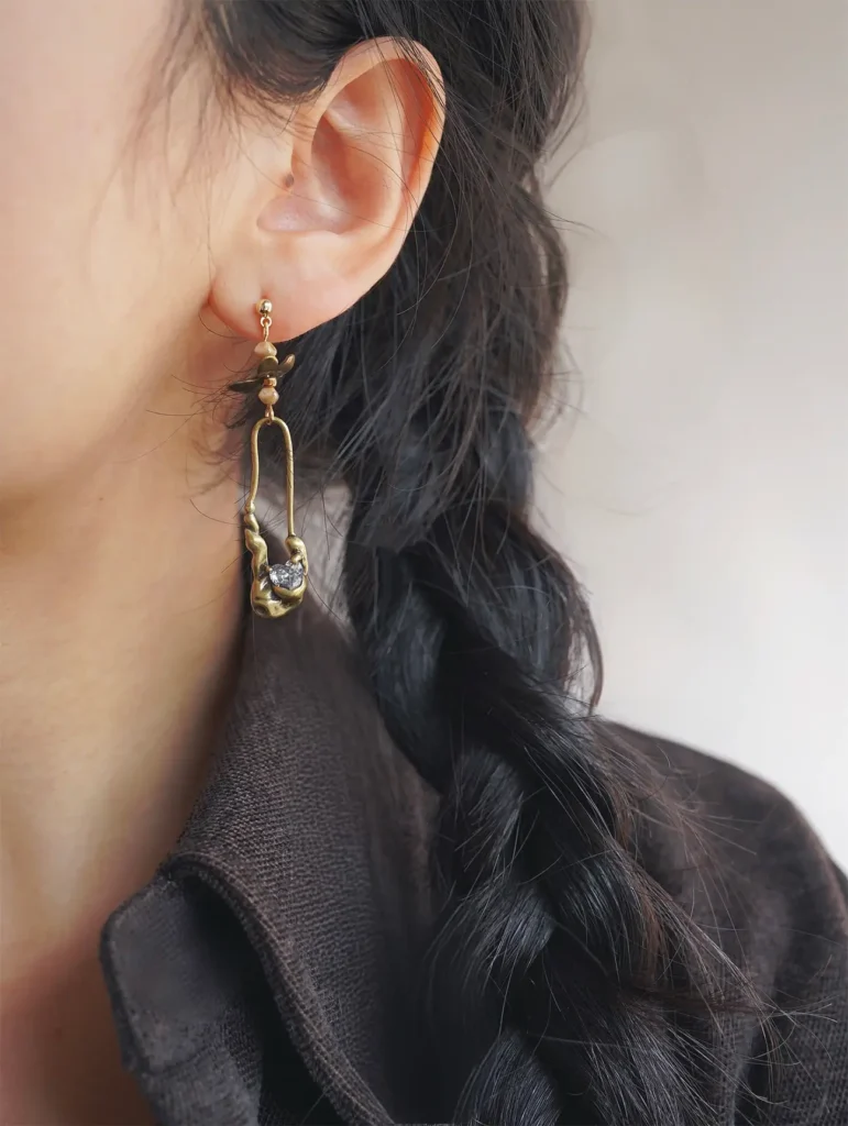 Jewea handcrafted S925 gold-plated sterling silver post earrings styled for casual daytime wear.