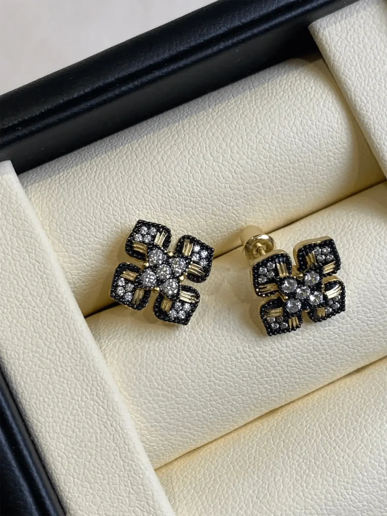 Handcrafted hypoallergenic stud earrings adorned with sparkling zircon for effortless all-day comfort and versatile style.