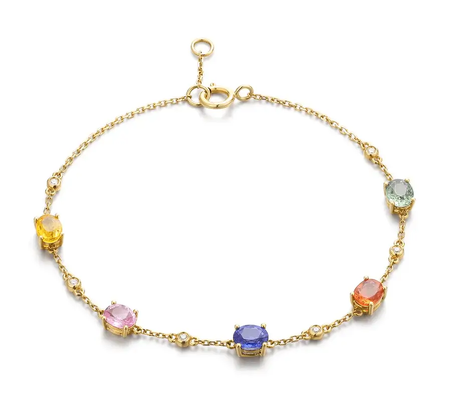 Jewea custom-colored gemstone gold bracelet, set with diamonds, showcasing vibrant gems and elegant design.