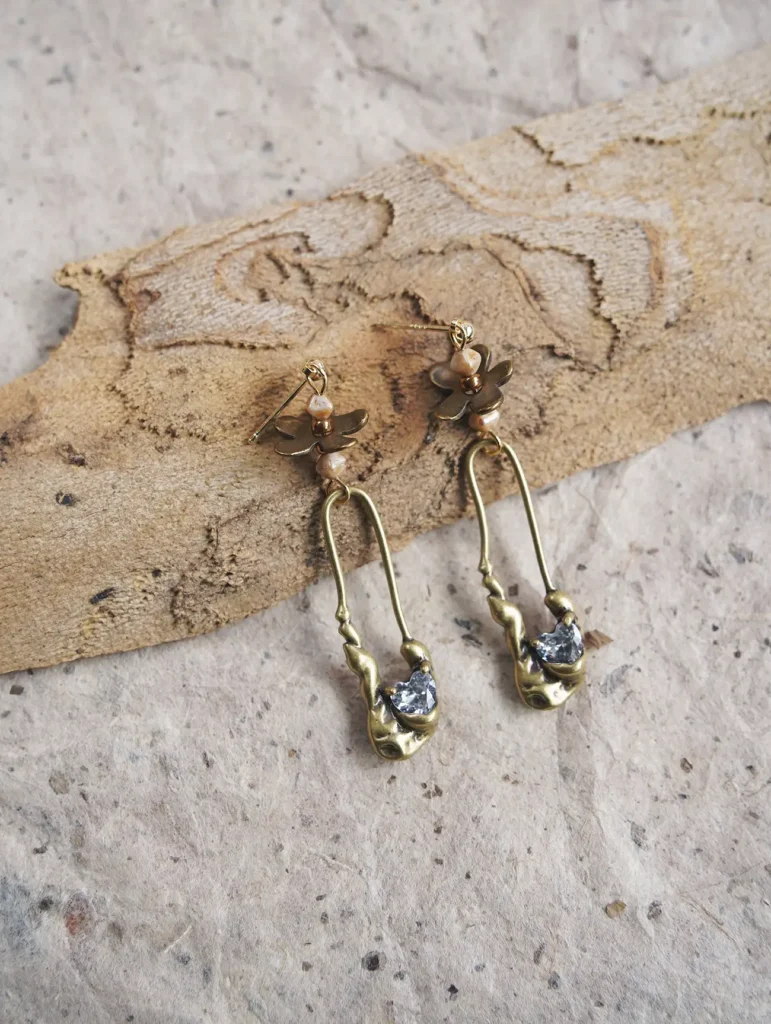 Abstract vintage S925 gold-plated sterling silver post earrings by Jewea showcased for elegant evening outfits.