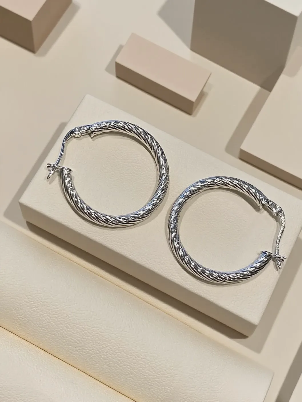 Jewea handcrafted sterling silver earrings made with traditional jewelry-making techniques and vintage artistry.