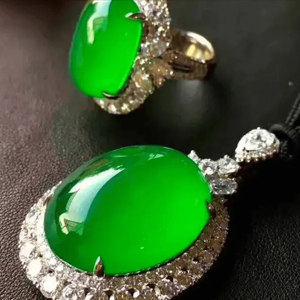 Jewea jadeite ring and pendant showcasing vivid, bright, saturated, and evenly distributed green color
